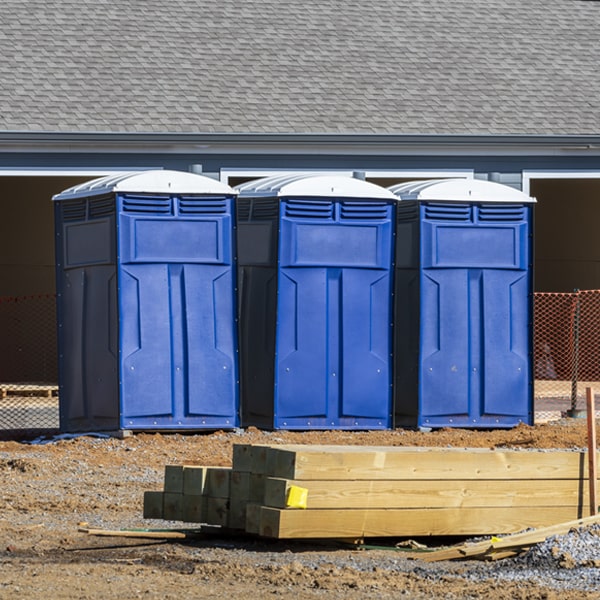 what is the cost difference between standard and deluxe porta potty rentals in Edwards MI